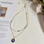 Two Stacked Necklaces With Natural Crystals